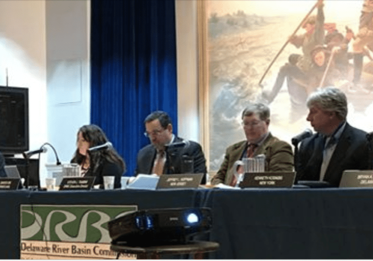 Screen Shot 2018-01-23 at 11.06.01 AM Executive Director of the Delaware River Basin Commission Steve Tambini (center) is flanked by representatives of the four river states. Out of the picture is the federal government's representative, from the U.S. Army Corps of Engineers.